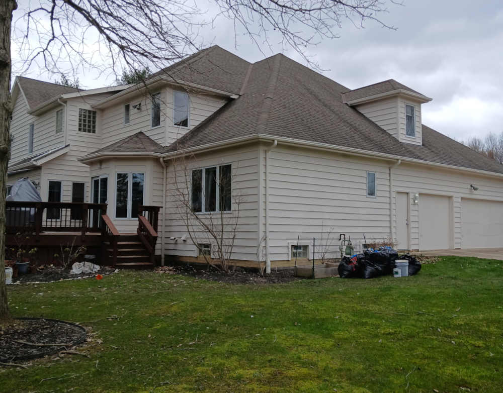 Large Solon, Ohio home after exterior painting, with smooth siding.